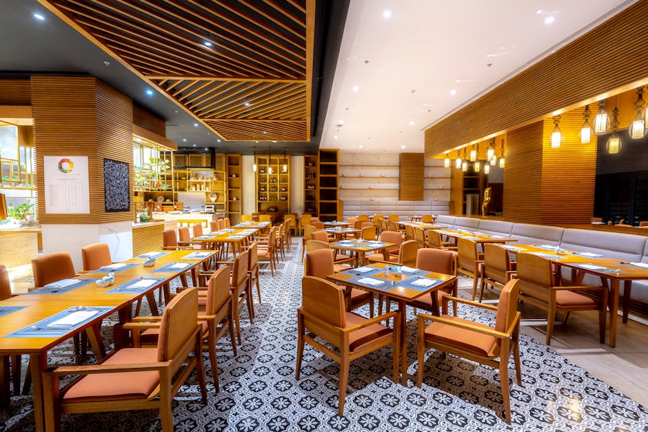 Elegantly designed restaurant with stylish furniture and ambient lighting, ideal for dining.