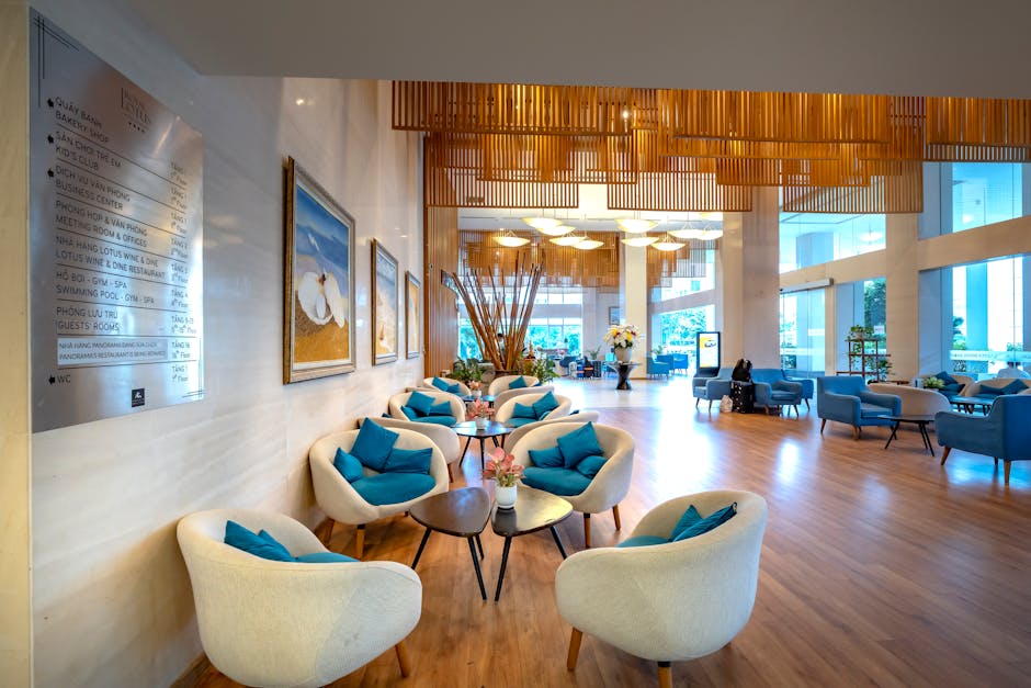 Spacious hotel lobby featuring stylish seating and contemporary decor with natural light.