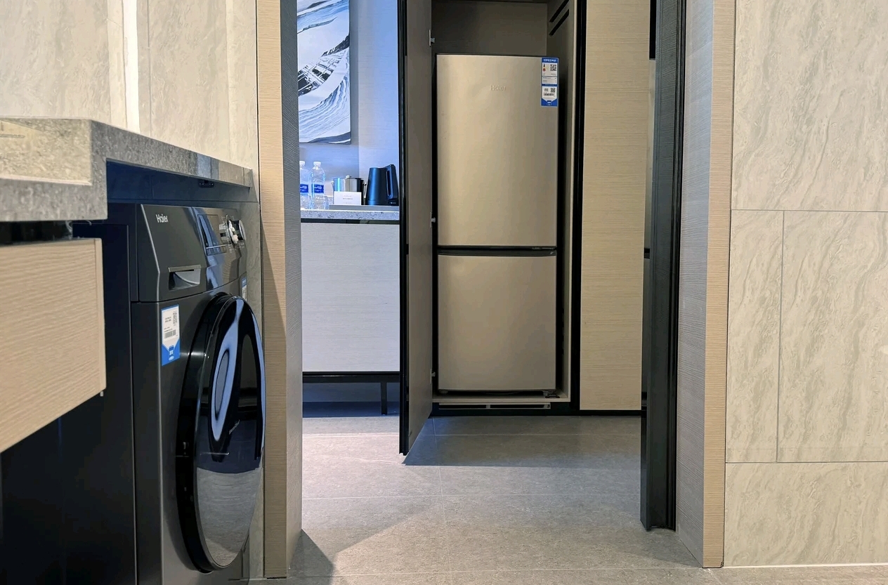 Room laundry washer-dryer cabinet at Courtyard Changchun Poly