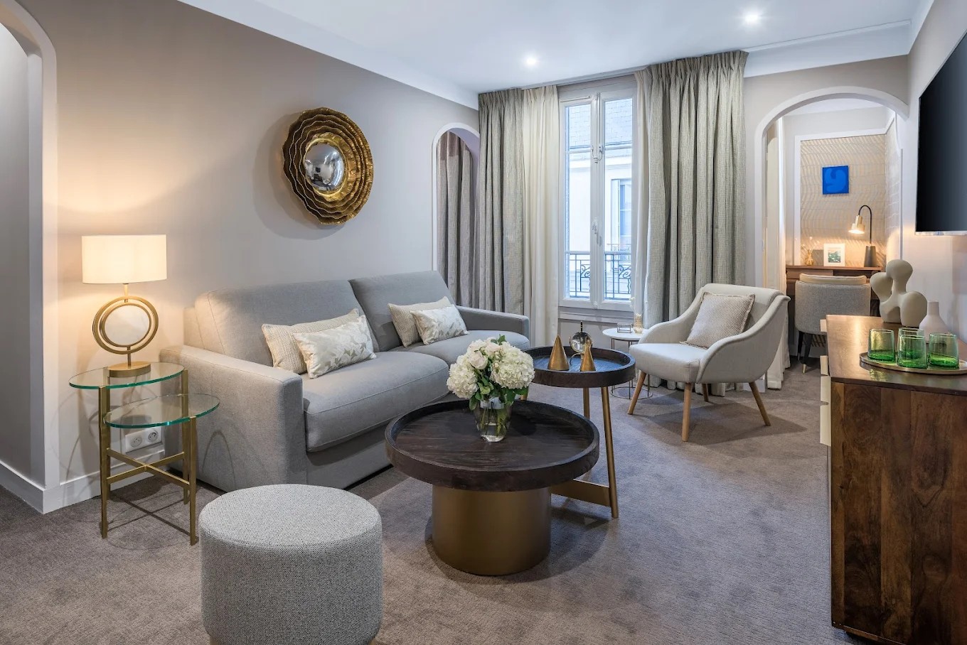 Casual sofa lounge corner in the lobby of Hotel Camille Paris