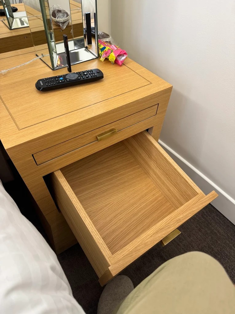 Room wood dresser and work desk at Hotel Camille Paris
