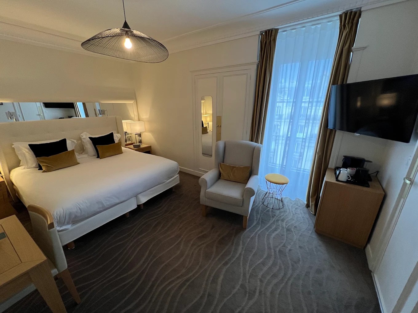 Standard King guestroom with city view at Hotel Camille Paris