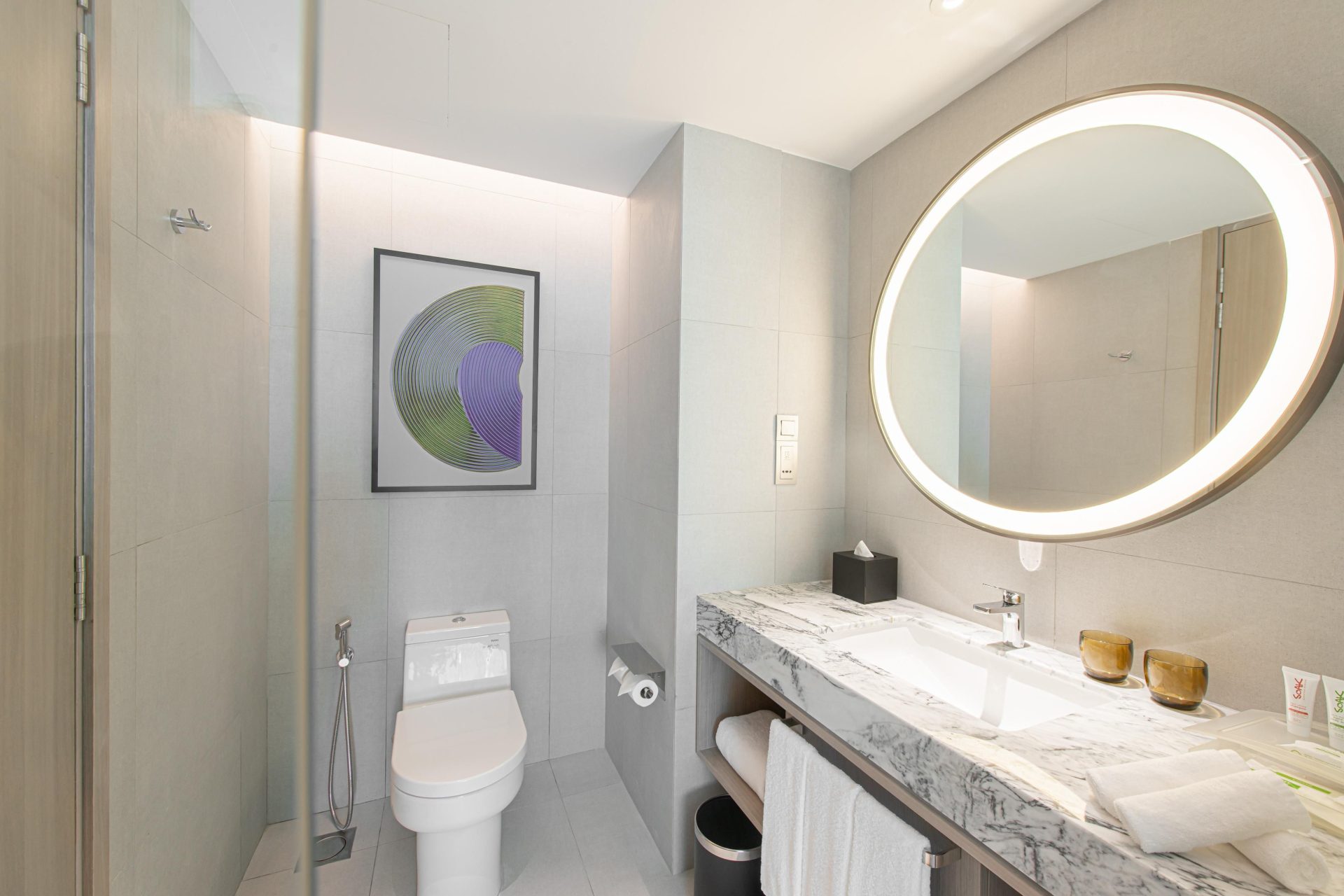 Holiday Inn Johor Bahru City Centre deluxe guestroom bathroom vanity area — furniture by Zhobai