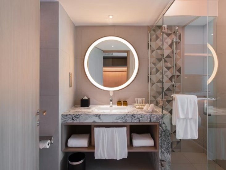 Holiday Inn Johor Bahru City Centre standard room bathroom zone — furniture by Zhobai