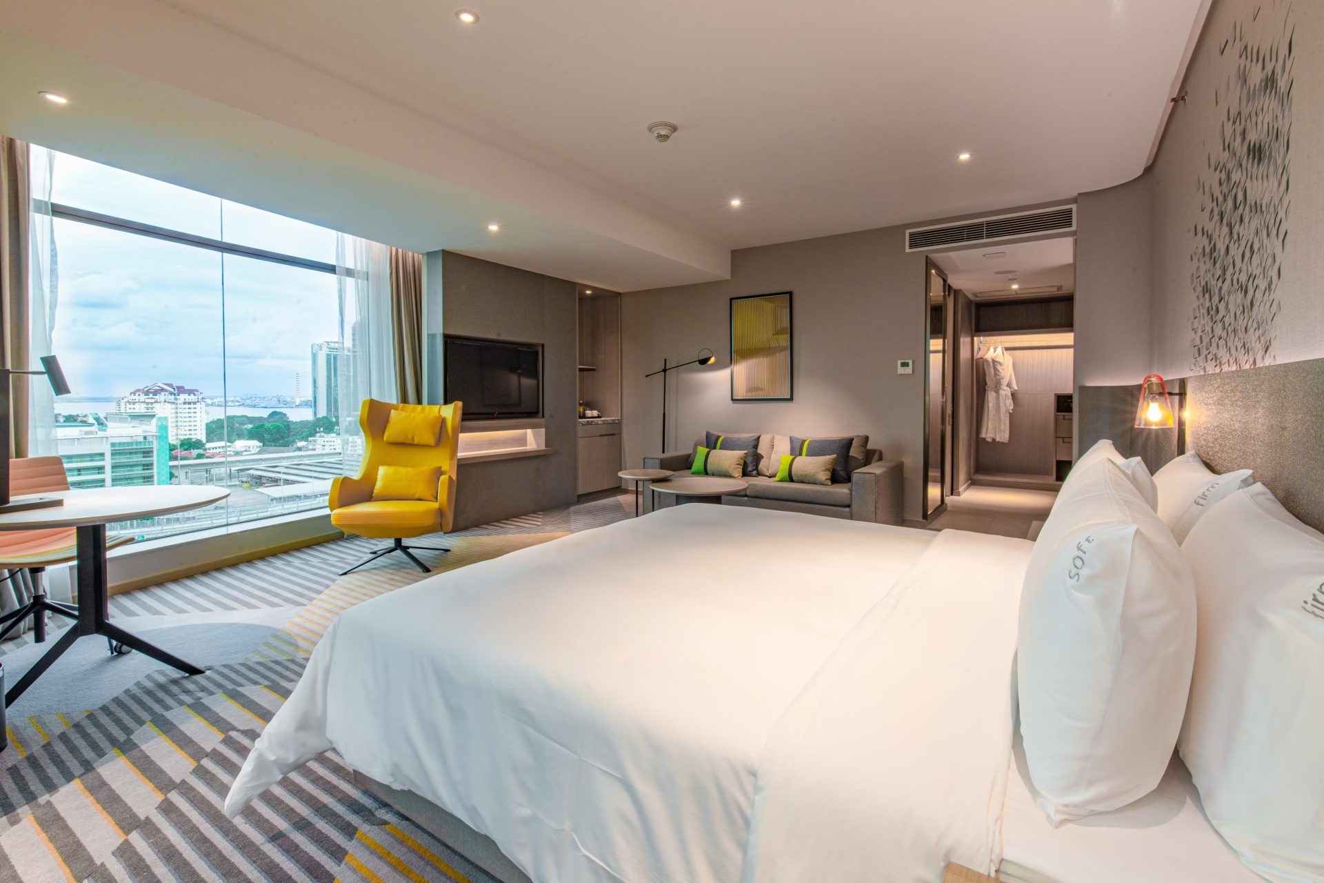 Holiday Inn Johor Bahru city view king bed guest room — furniture by Zhobai