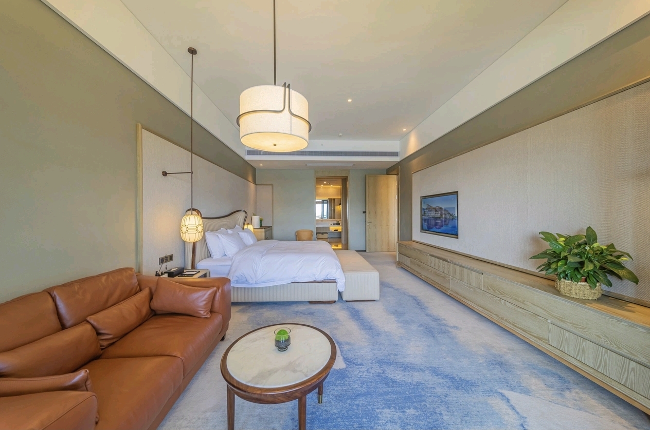 Jolie Vue Hotel Yulin deluxe room sitting corner — lounge furniture by Zhobai