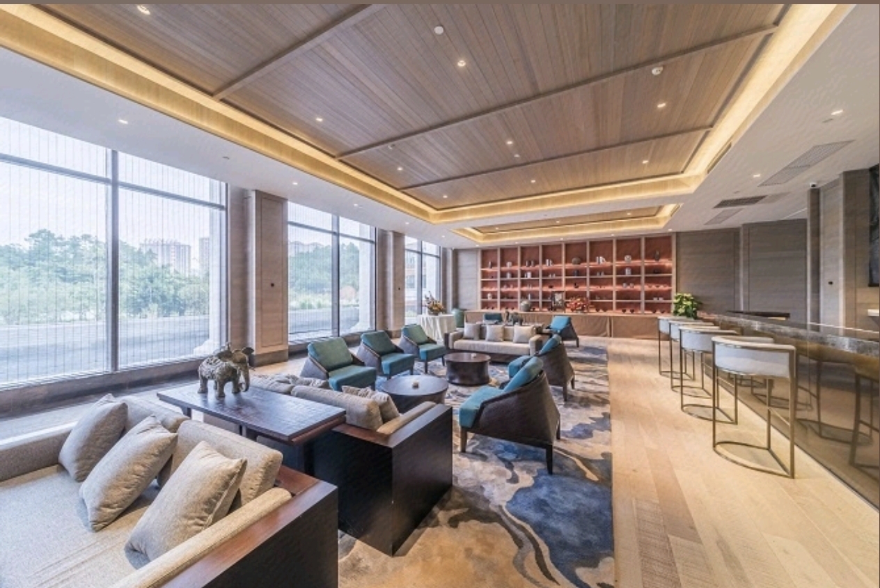 Jolie Vue Hotel Yulin executive room work and lounge area — furniture by Zhobai