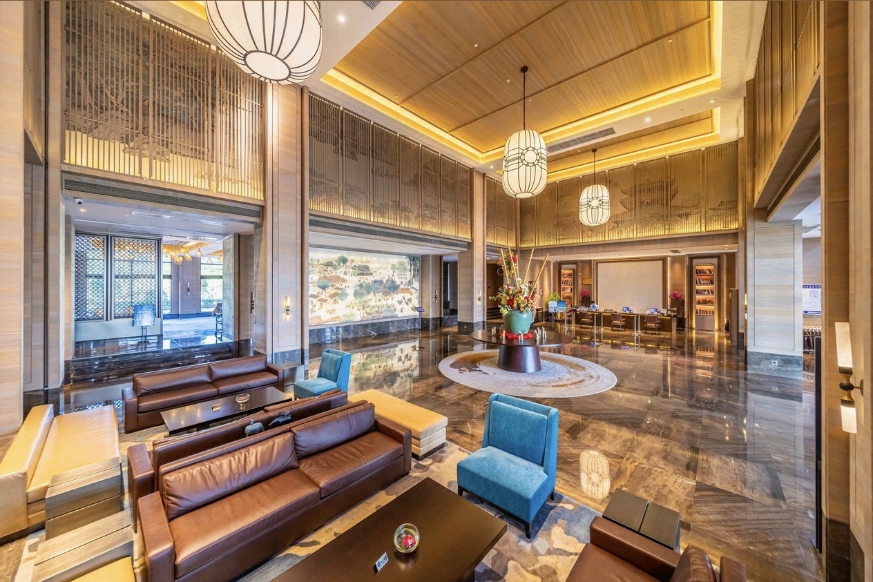 Jolie Vue Hotel Yulin main lobby reception — hotel furniture by Zhobai
