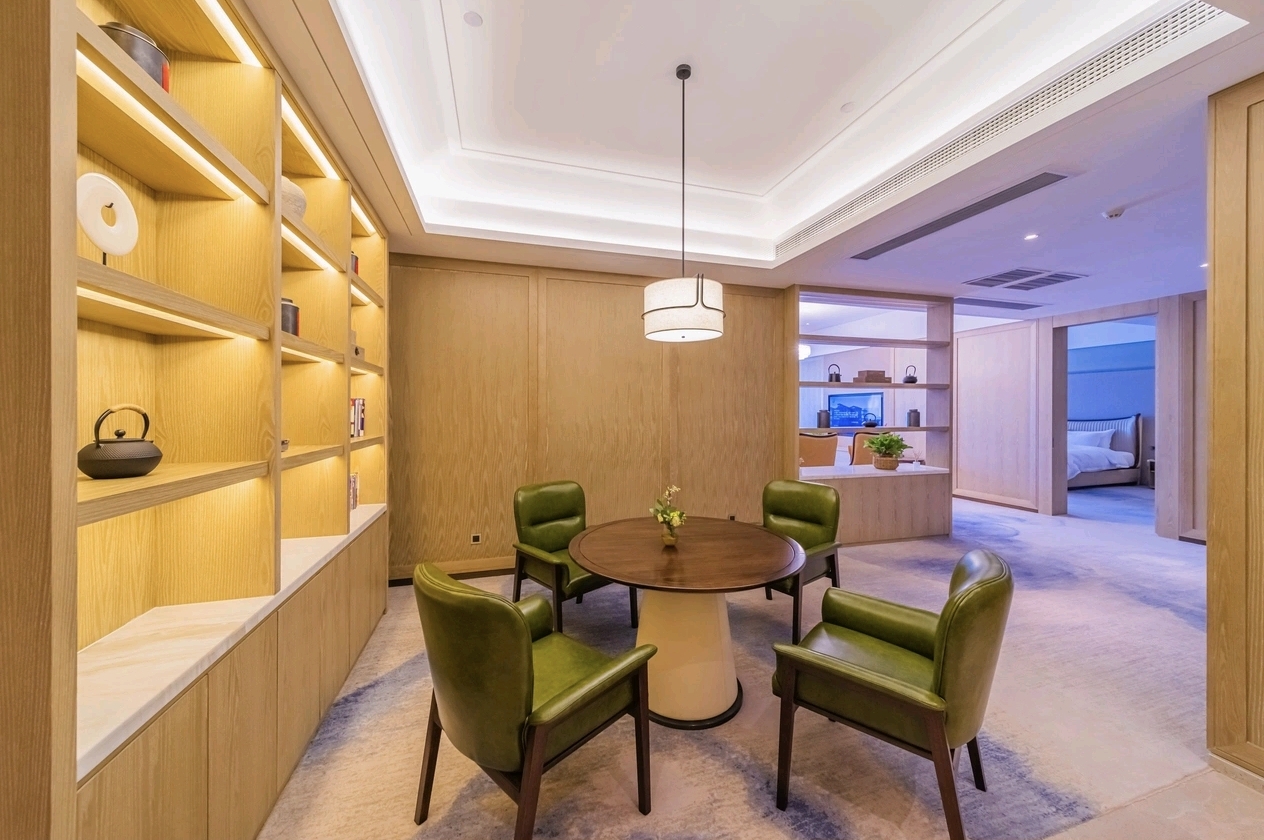 Jolie Vue Hotel Yulin suite entry and dining nook — suite furniture by Zhobai