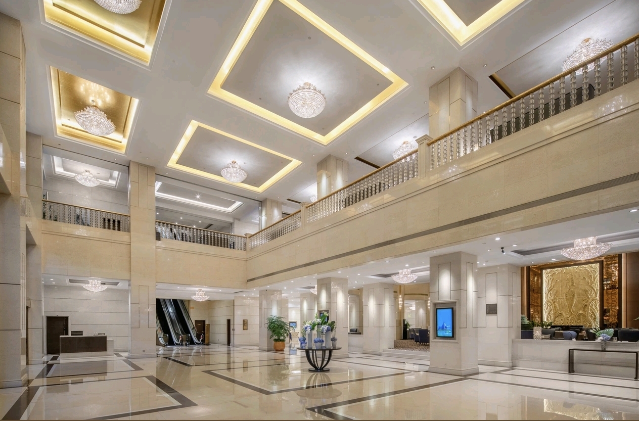 Kempinski Hotel Guiyang atrium lobby corridor — furniture and design by Zhobai