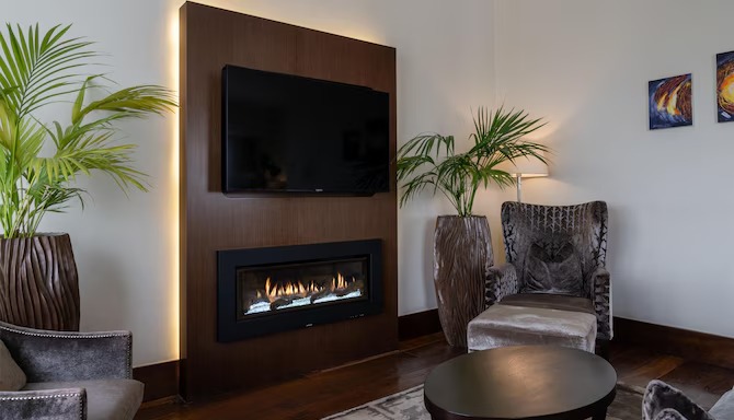 Radisson Blu Addis Ababa suite fireplace lounge area — furniture by Zhobai