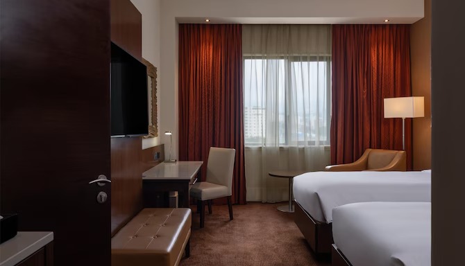 Radisson Blu Addis Ababa twin bed guest room — hotel furniture by Zhobai