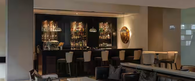 Radisson Blu Addis Ababa wine bar counter — custom bar furniture by Zhobai