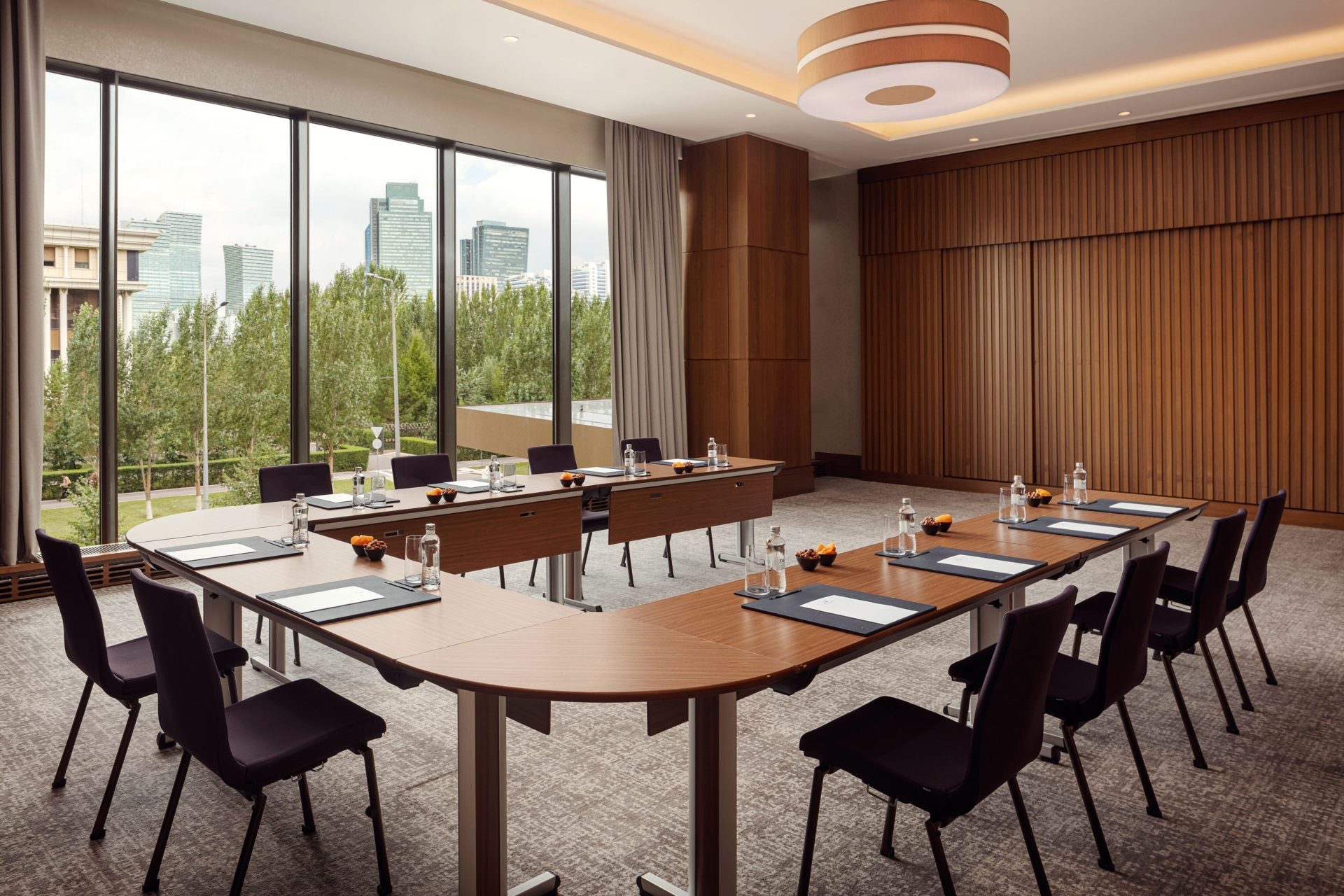 The Ritz-Carlton Almaty boardroom meeting room — conference furniture by Zhobai