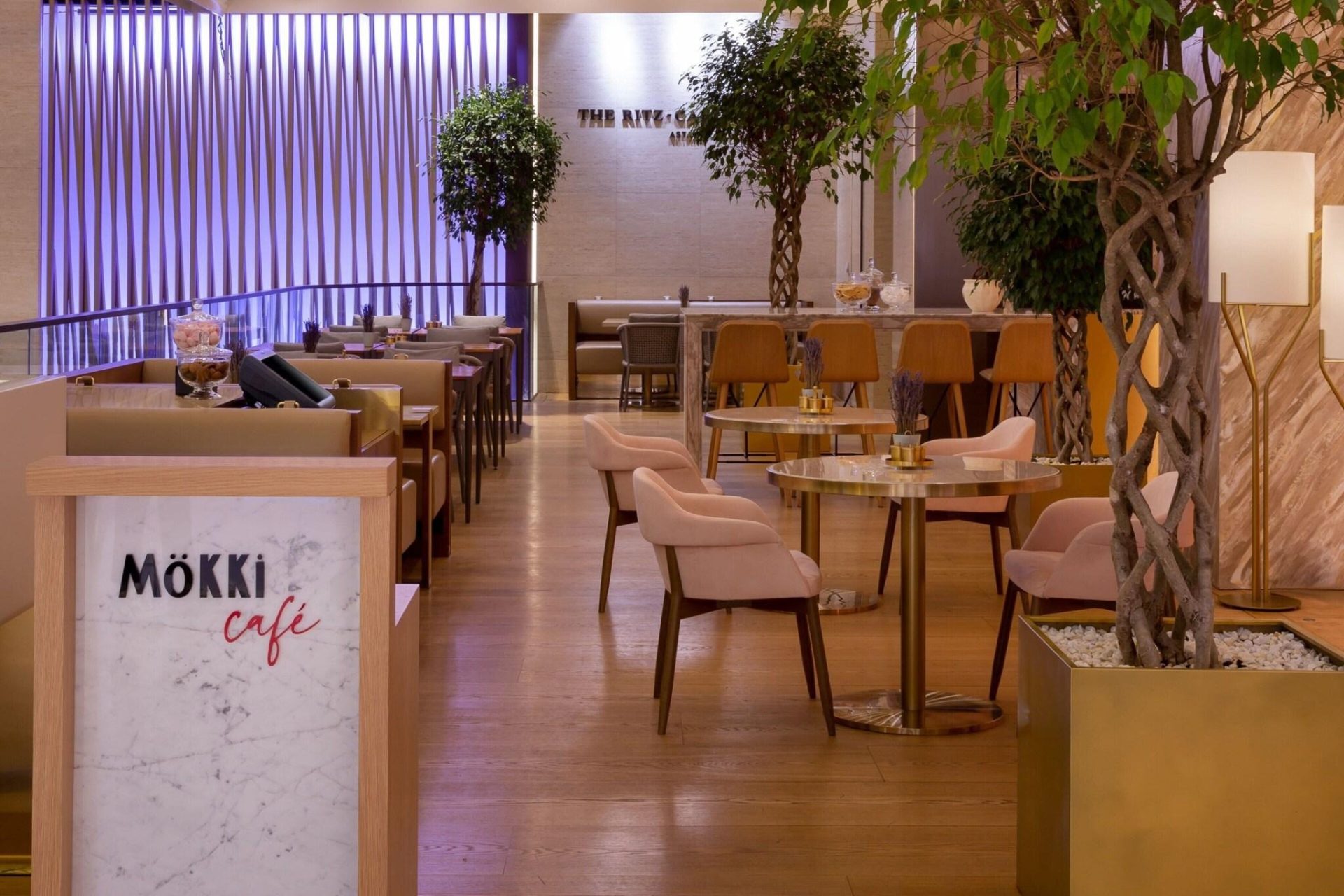 The Ritz-Carlton Almaty lobby coffee bar area — bar furniture by Zhobai