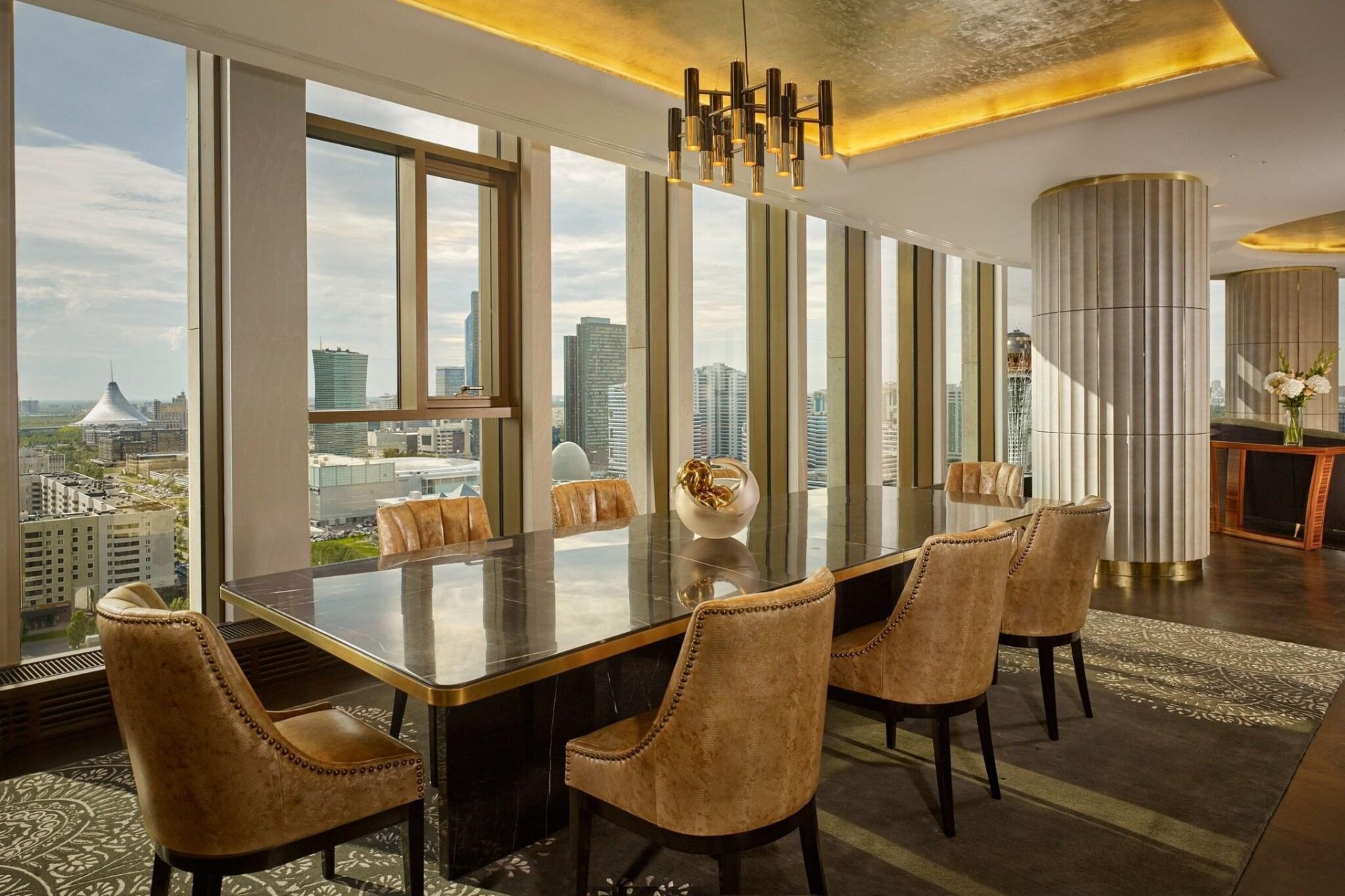 The Ritz-Carlton Almaty lobby dining business table — furniture by Zhobai