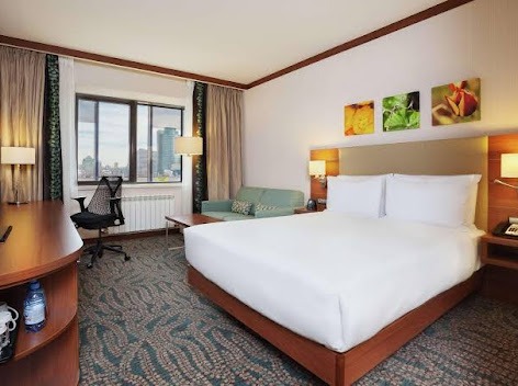 The Ritz-Carlton Almaty standard king guest room — furniture by Zhobai