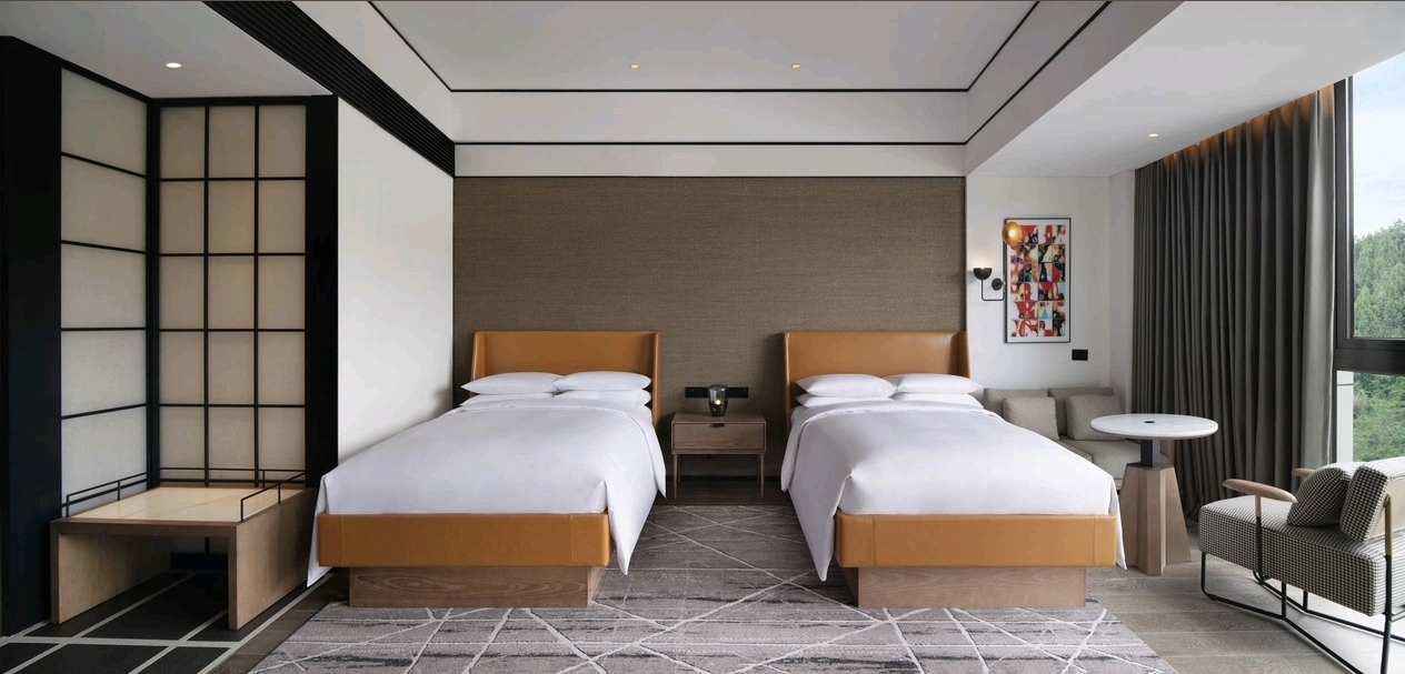 Sheraton Mianyang Xianhai mountain view twin guest room — furniture by Zhobai
