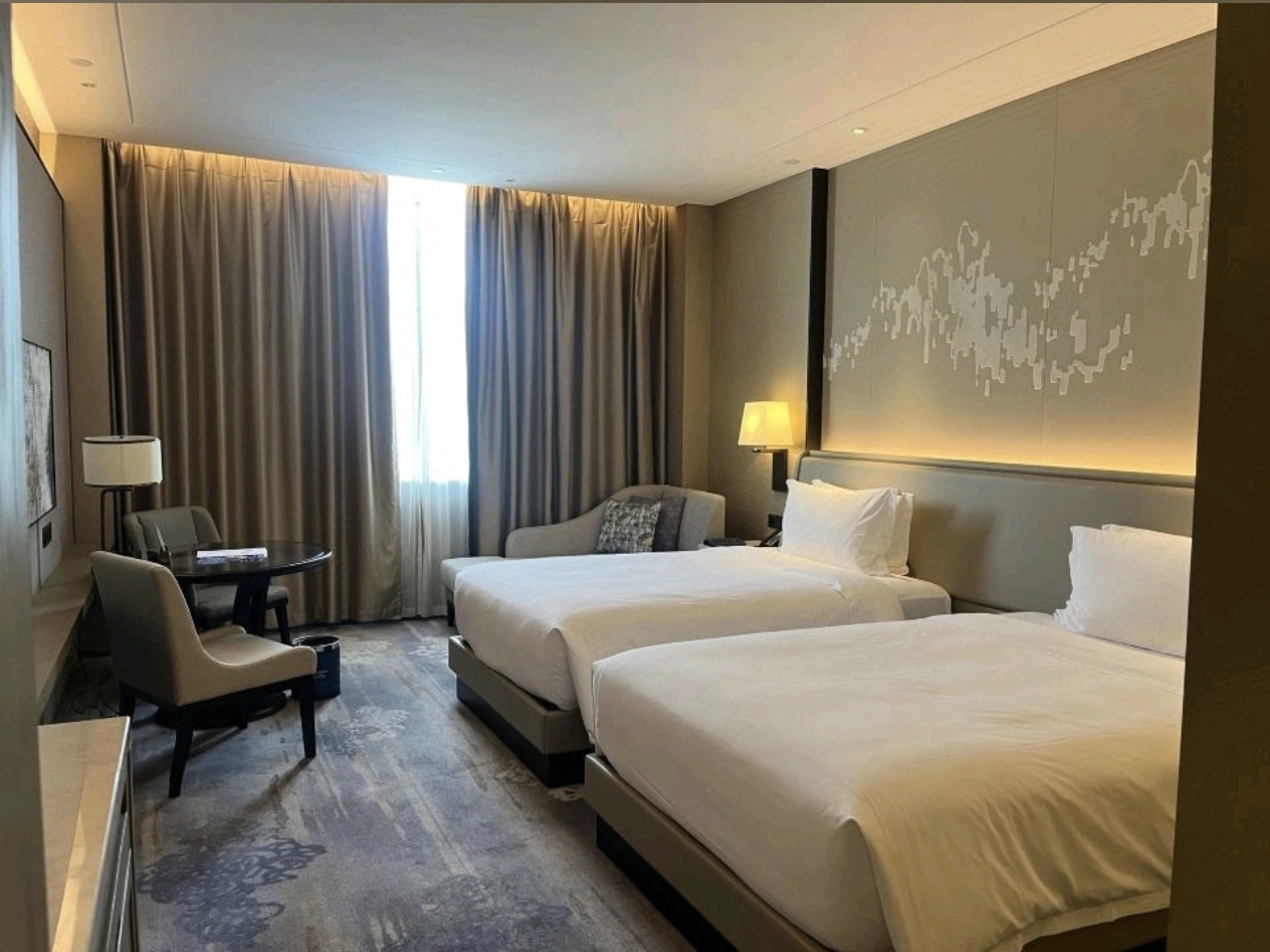 Wyndham Baise Resort twin bed guest room — furniture by Zhobai