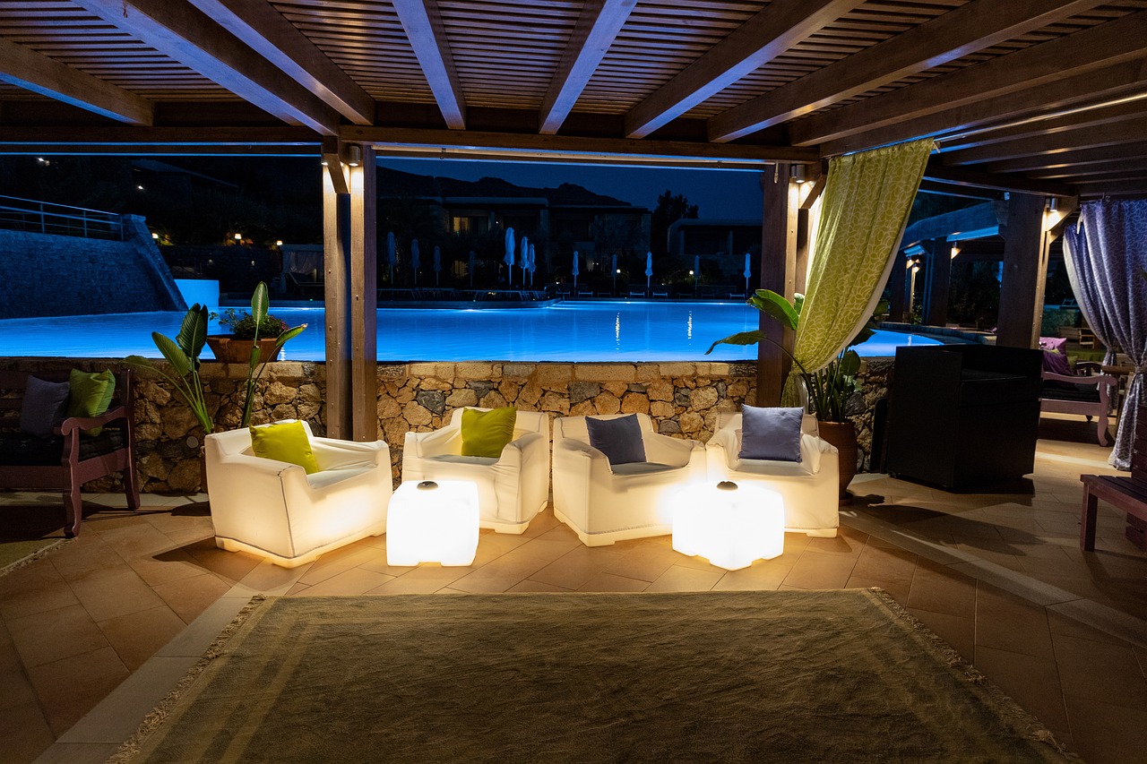 A stylish hotel lounge area with modular seating and smart lighting, demonstrating versatile Middle East hotel furniture for multi-functional spaces.