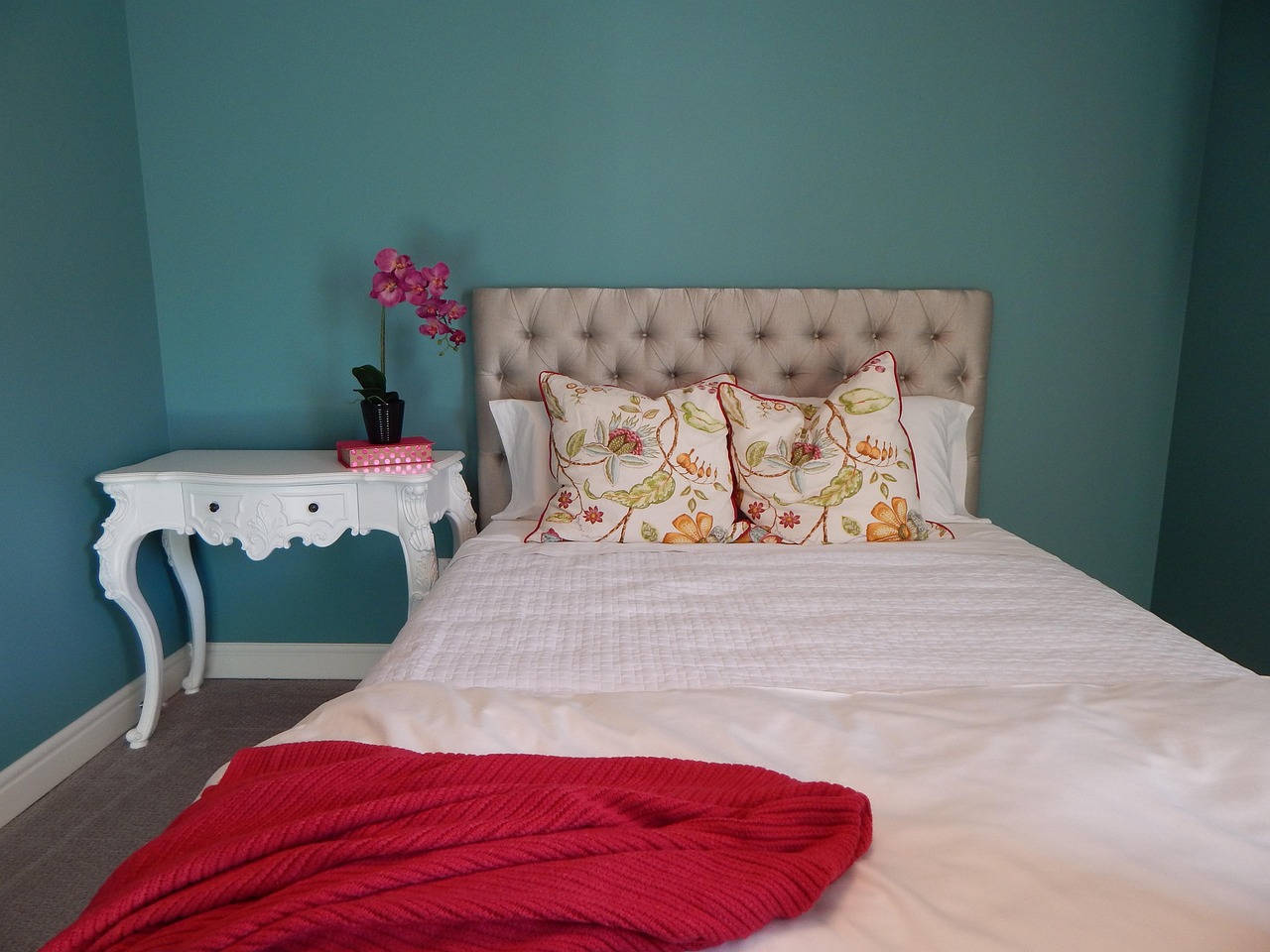 factory mock-up room with bed, nightstand, wardrobe and wall art exactly matching hotel brand standards