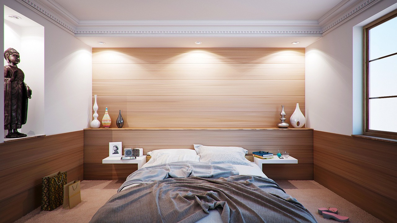 minimalist hotel guestroom interior with custom wooden furniture and a large window view
