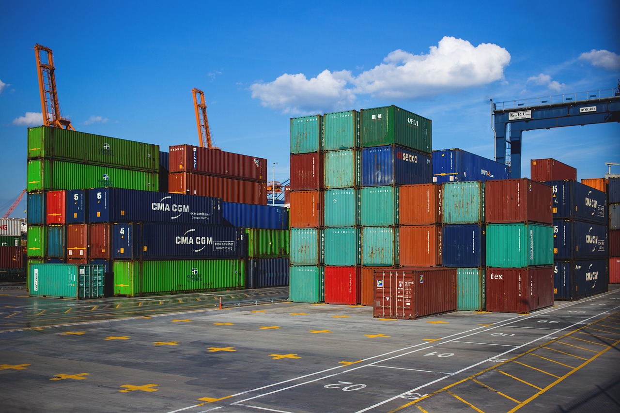 Shipping containers at Chinese port with hotel furniture for export