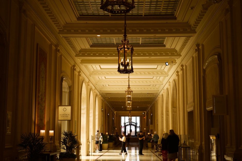 Luxurious hotel foyer with classic interiors and chandeliers, capturing a sense of elegance and sophistication.
